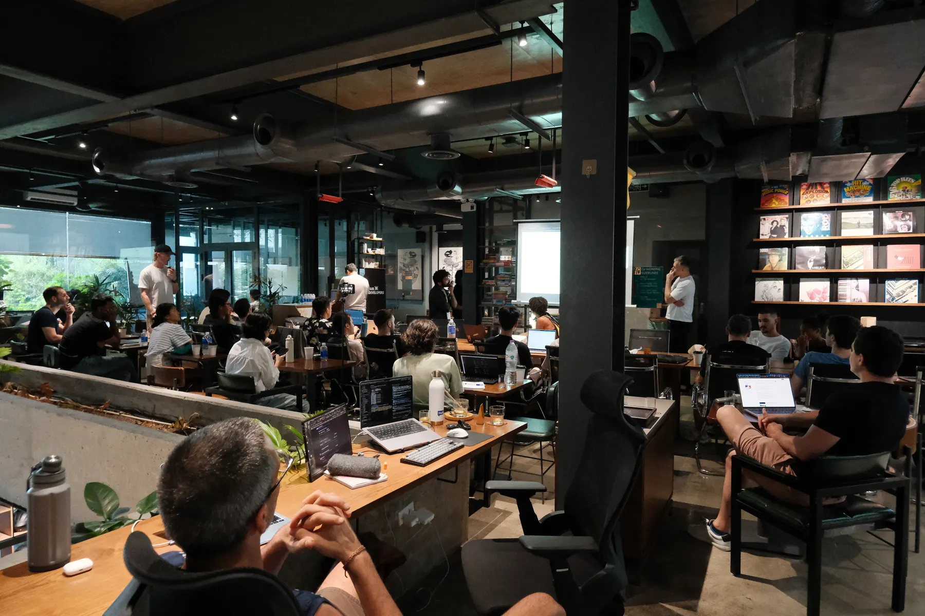 Builders co-working with laptops during Frontier Club AI Meetup #2 in Da Nang