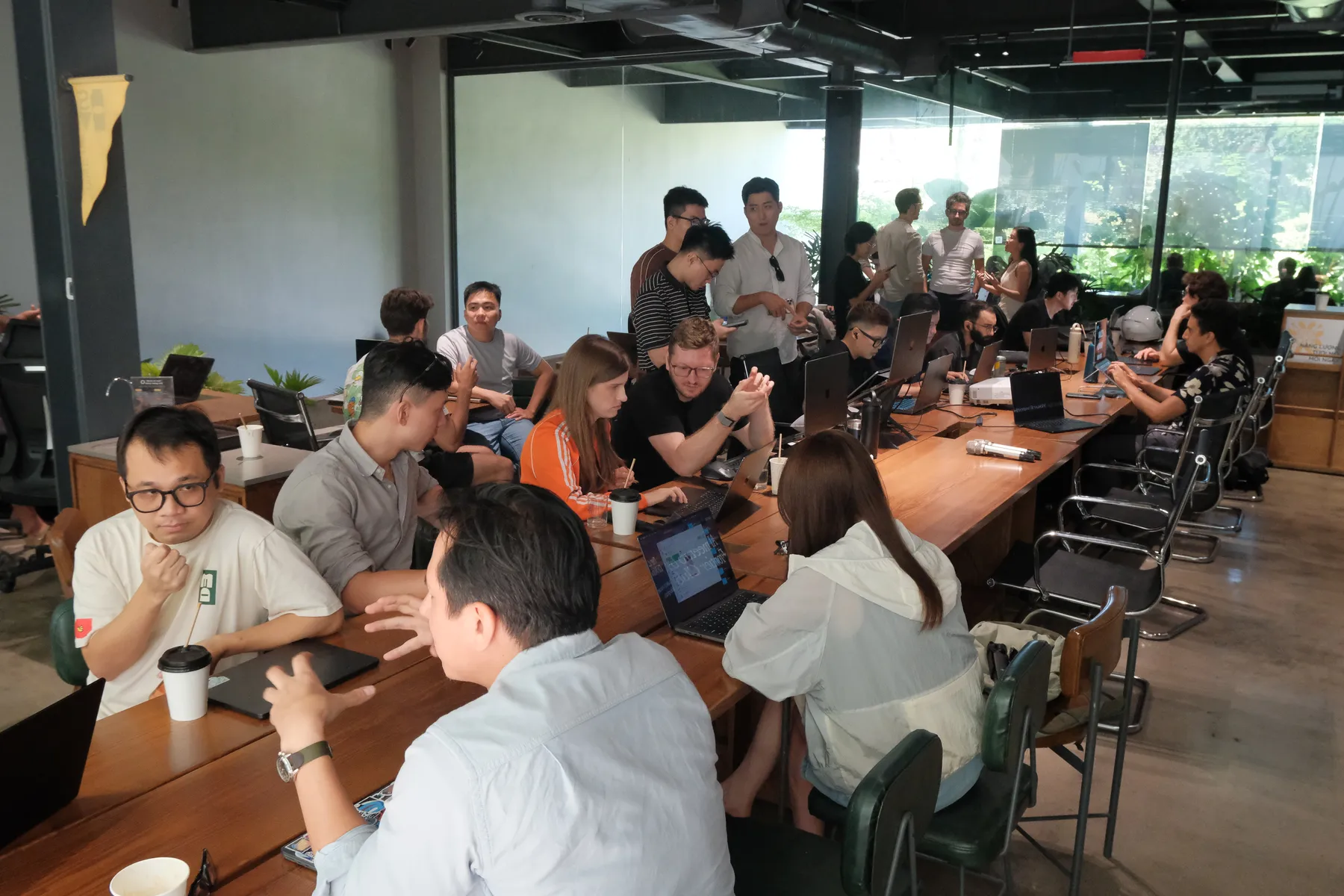 Builders working together at Frontier Club AI Meetup in Da Nang
